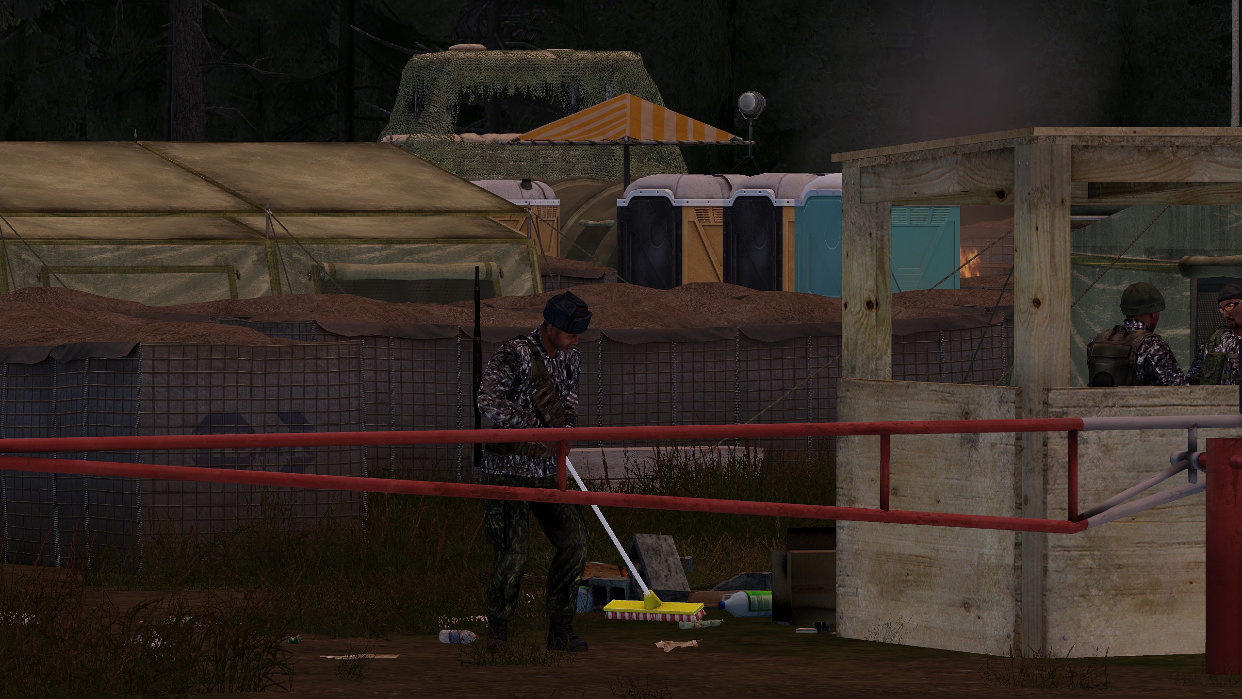 Former Zelenogorsk base commander seen cleaning trash in some remote chedaki camp. Two chedaks standing in a guard box.