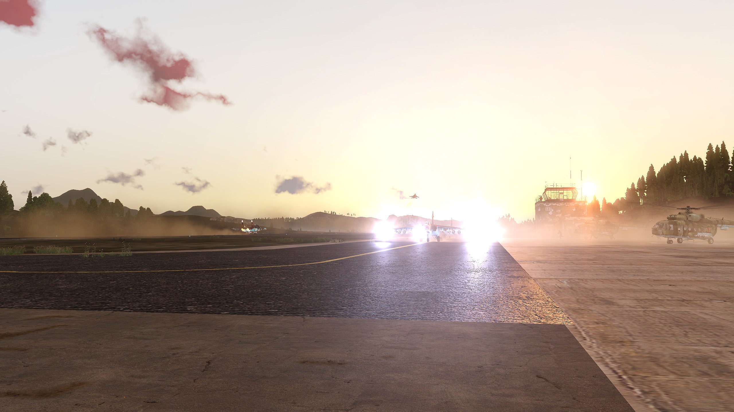 Russian planes take off from an airfield in the morning. Infantry embarking on helicopters can be seen in the background.